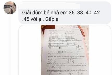 Nu sinh dua de thi Toan len mang anh 1